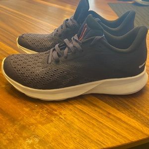 Reebok women’s running shoe. Size 8. Color Purple.